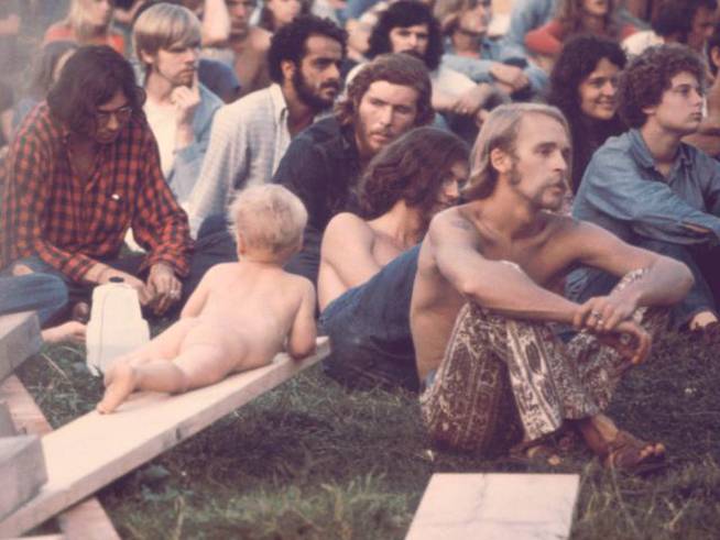 Público asistente en el concierto de Hog Farmers, en el festival de Woodstock de 1969.