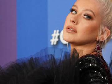 Christina Aguilera celebra los 18 años de ‘Stripped’ con las fotos más sensuales de su época de ‘chica mala’