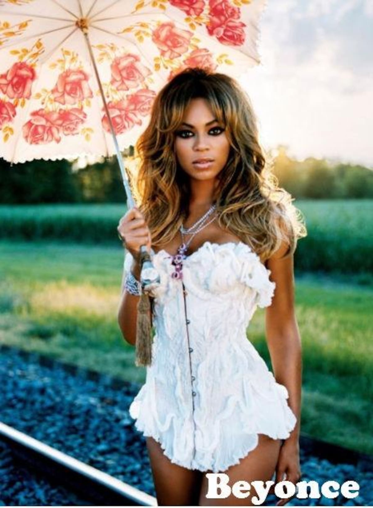 ¡Qué chulo el paraguas de Beyonce! Con esas flores, esos colores...