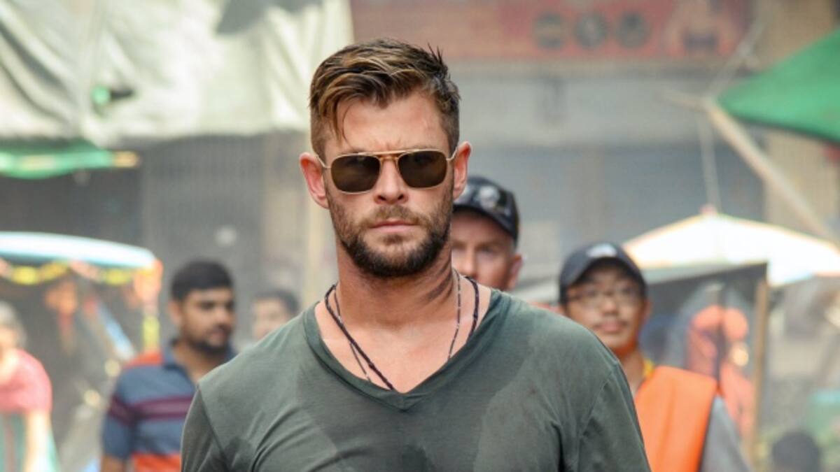 Tyler Rake con Chris Hemsworth