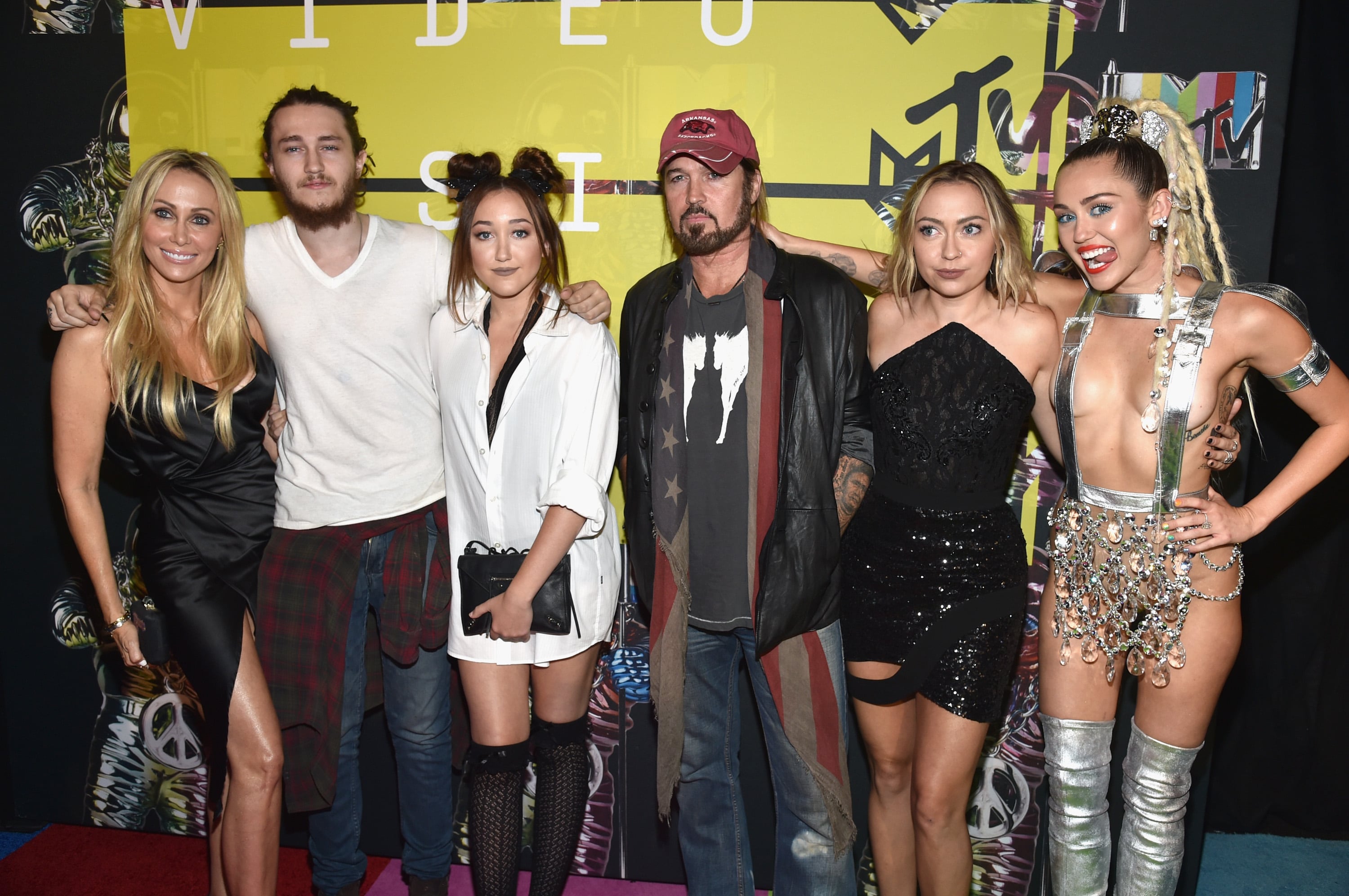 LOS ANGELES, CA - AUGUST 30:  (L-R) Producer Tish Cyrus, actors Braison Cyrus, Noah Cyrus, recording artist Billy Ray Cyrus, actress Brandi Glenn Cyrus and host Miley Cyrus attend the 2015 MTV Video Music Awards at Microsoft Theater on August 30, 2015 in Los Angeles, California.  (Photo by John Shearer/Getty Images)