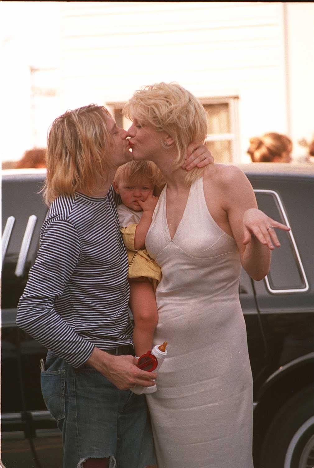 Kurt Cobain y Courtney Love con su hija Frances