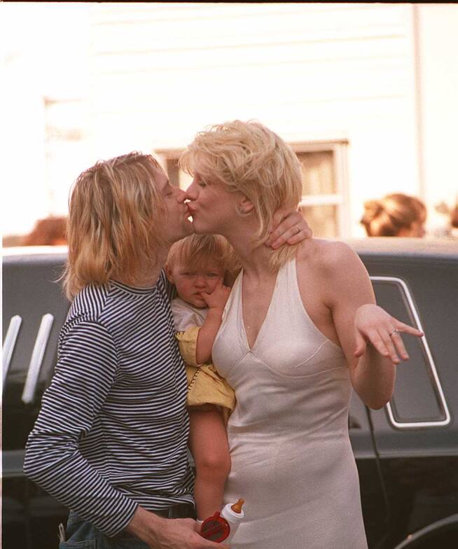 Kurt Cobain y Courtney Love con su hija Frances