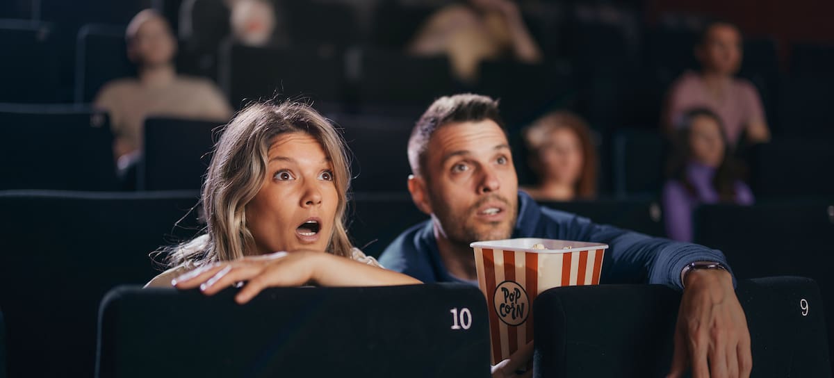 Unos espectadores disfrutando de una película en una sala de cine, / Getty