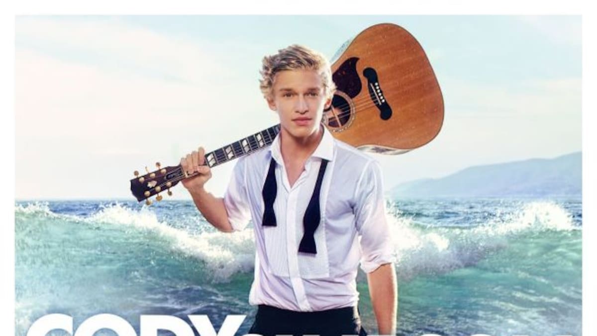 Artistas con guitarra en mano