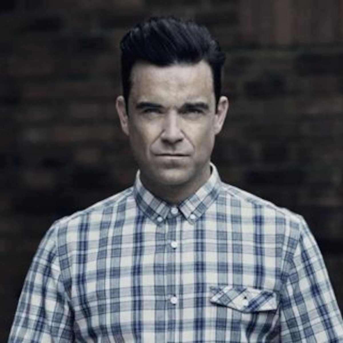 ¡Robbie Williams demandado por acoso sexual!