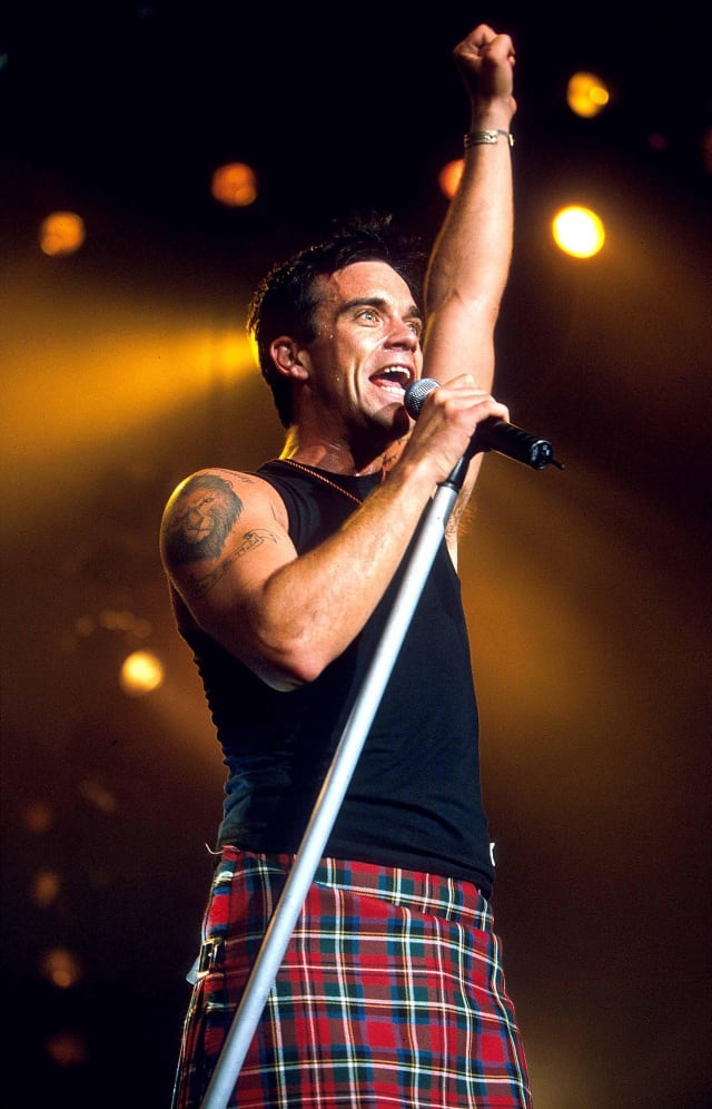 Robbie Williams, en concierto en 2001.