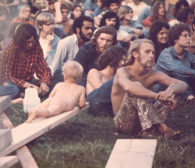 Público asistente en el concierto de Hog Farmers, en el festival de Woodstock de 1969.