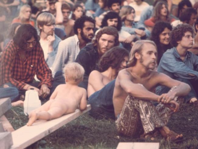 Público asistente en el concierto de Hog Farmers, en el festival de Woodstock de 1969.