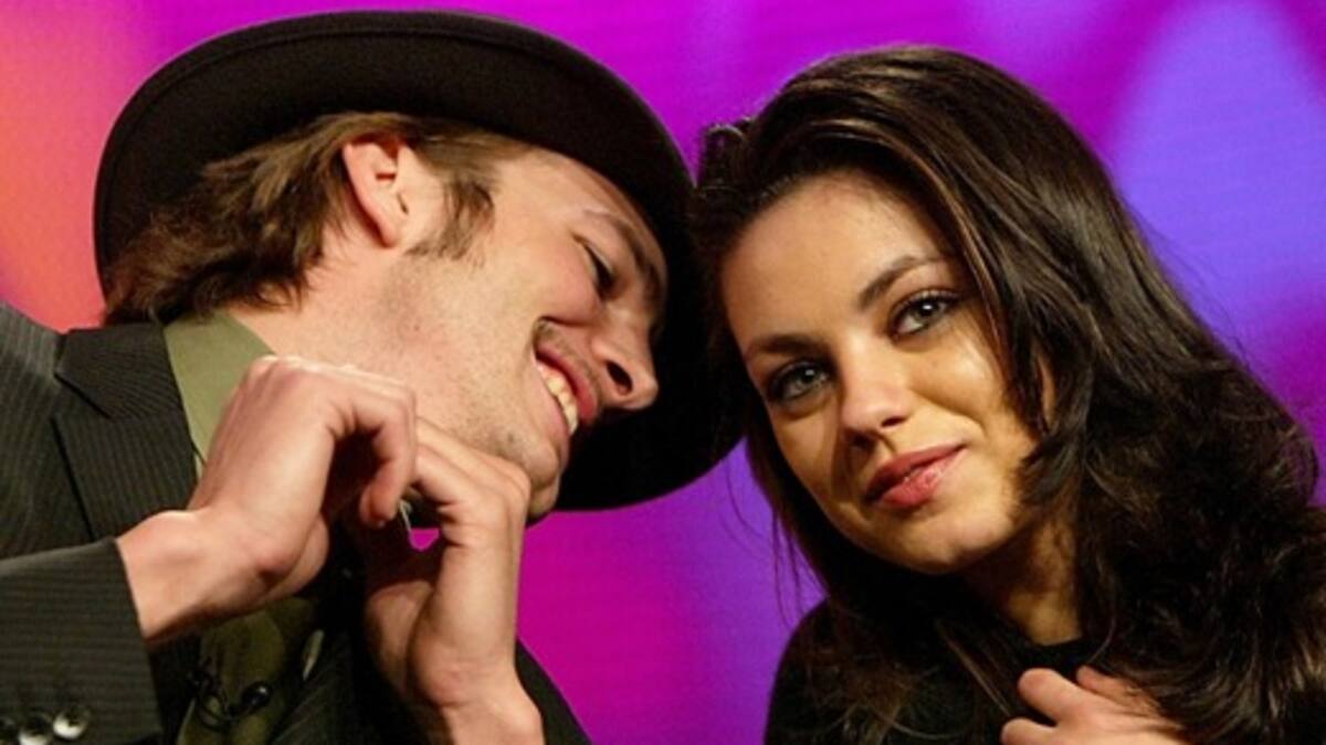 Mila Kunis y Ashton Kutcher amigos de la realeza