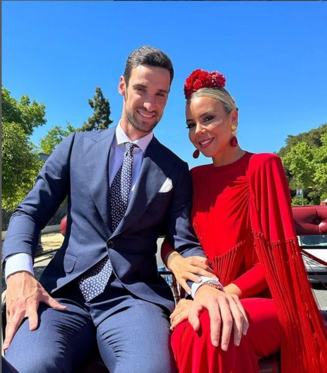 Alba Silva y Sergio Rico en la Feria de Sevilla.