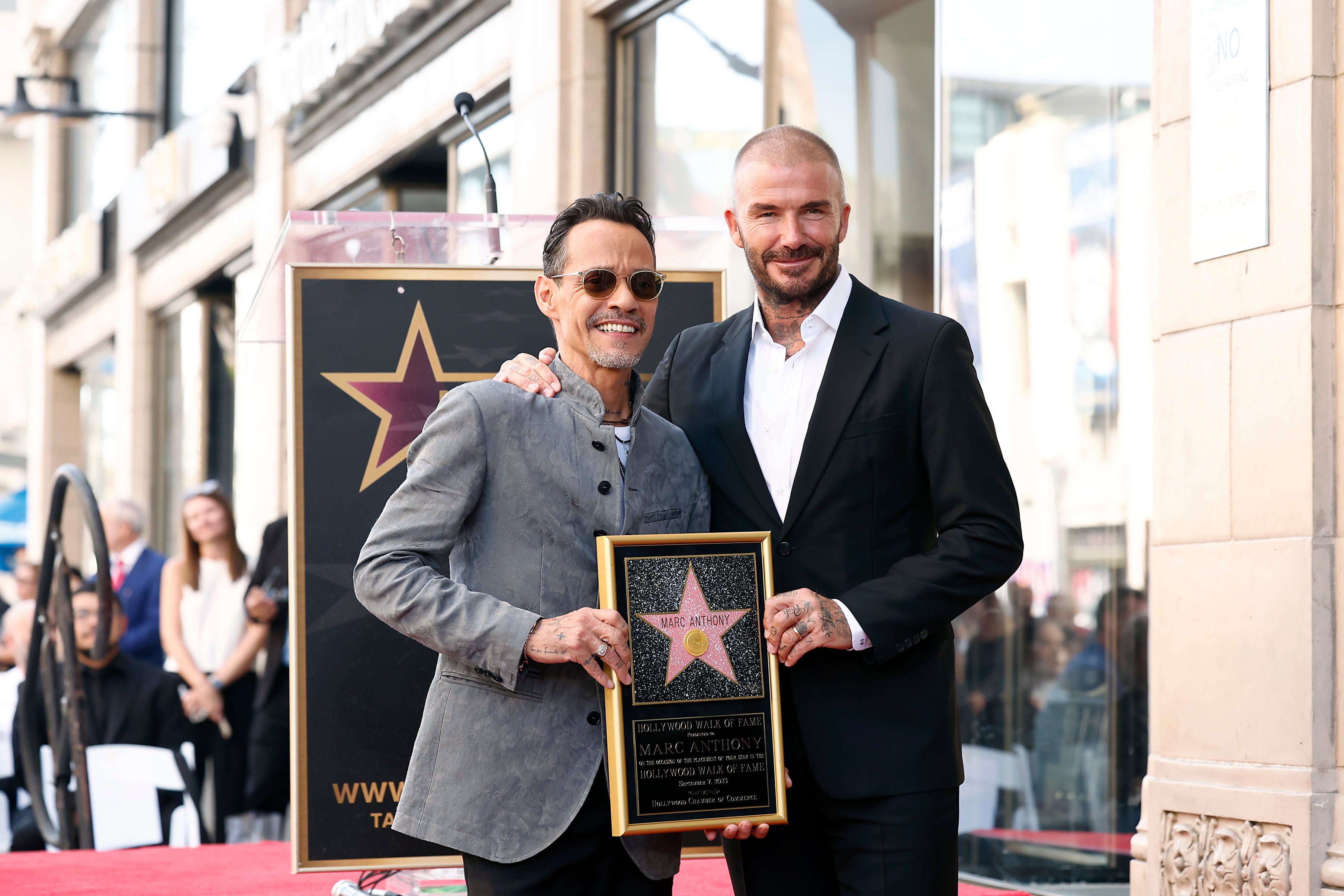 Marc Anthony y David Beckham.