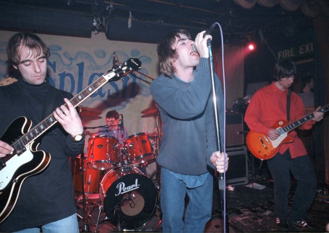 Paul Arthurs, Noel Gallagher y Liam Gallagher de Oasis