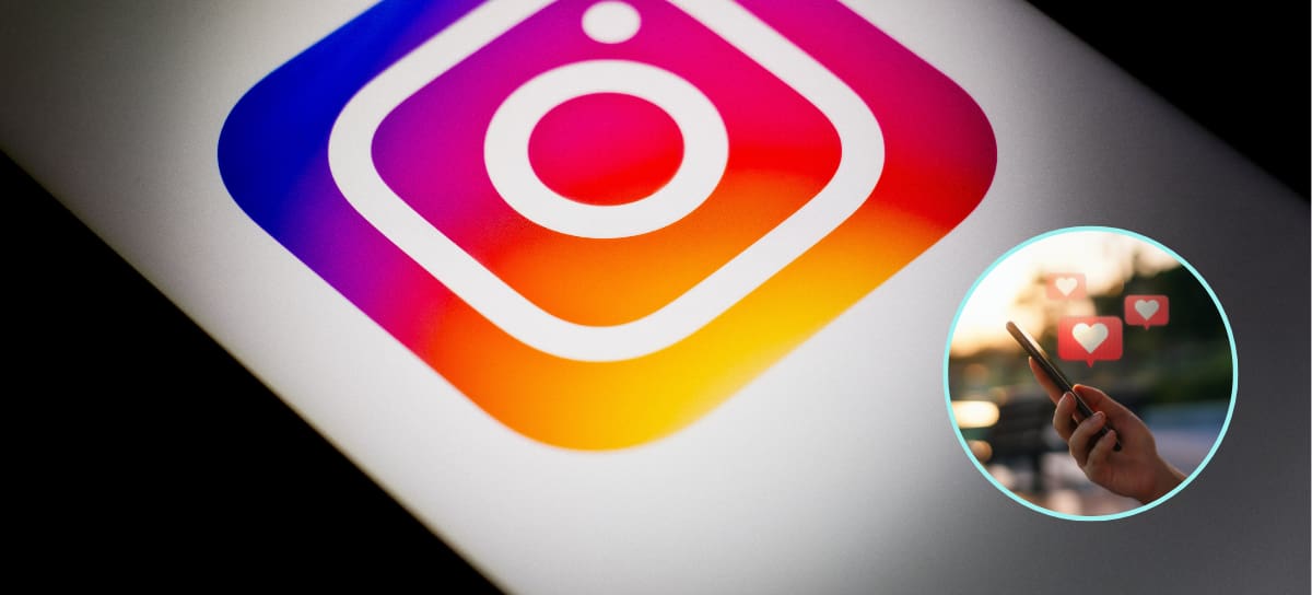 Logo de instagram y de fondo una persona interactuando por redes sociales con su celular (Foto vía Getty Images)