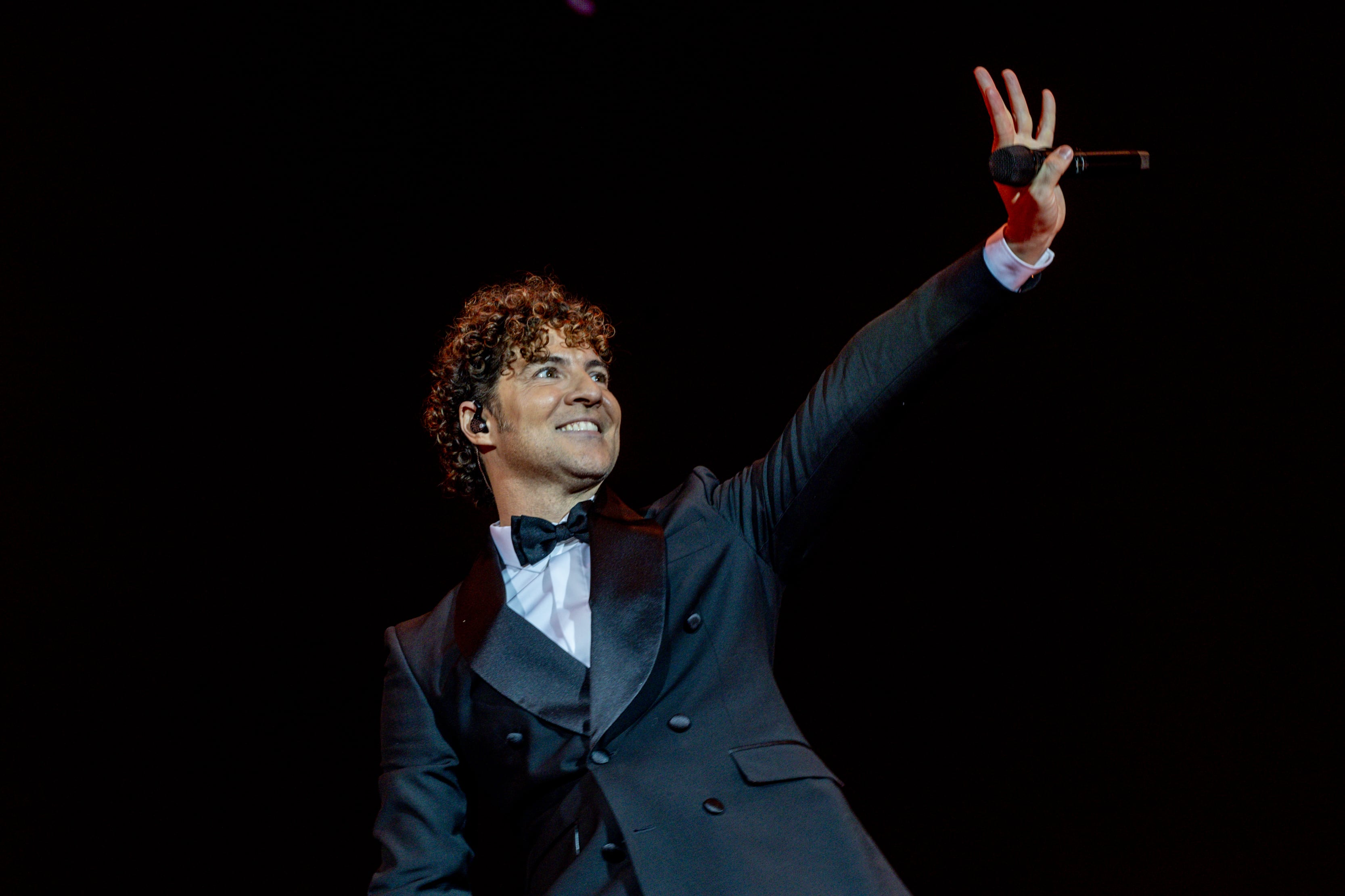 David Bisbal actuando en el Movistar Arena de Madrid con su gira ''Todo es posible en Navidad'. / Ricardo Rubio/Europa Press via Getty