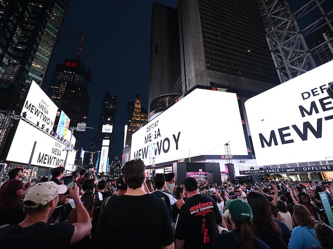 Pokémon GO fans await the arrival of Mega Mewtwo Y at the Pokémon GO 10th Anniversary Celebration in Times Square on Thursday, July 9, 2026, in New York. (Carla Torres/AP Content Services for Scopely Explore)