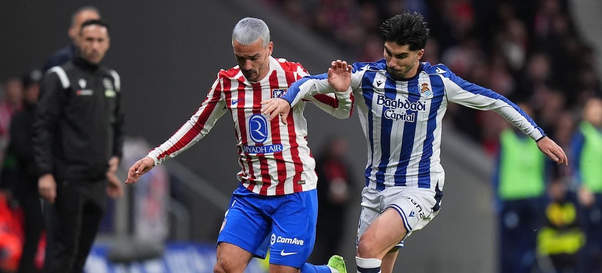 Antoine Griezmann de Atlético de Madrid y Carlos Soler de la Real Sociedad