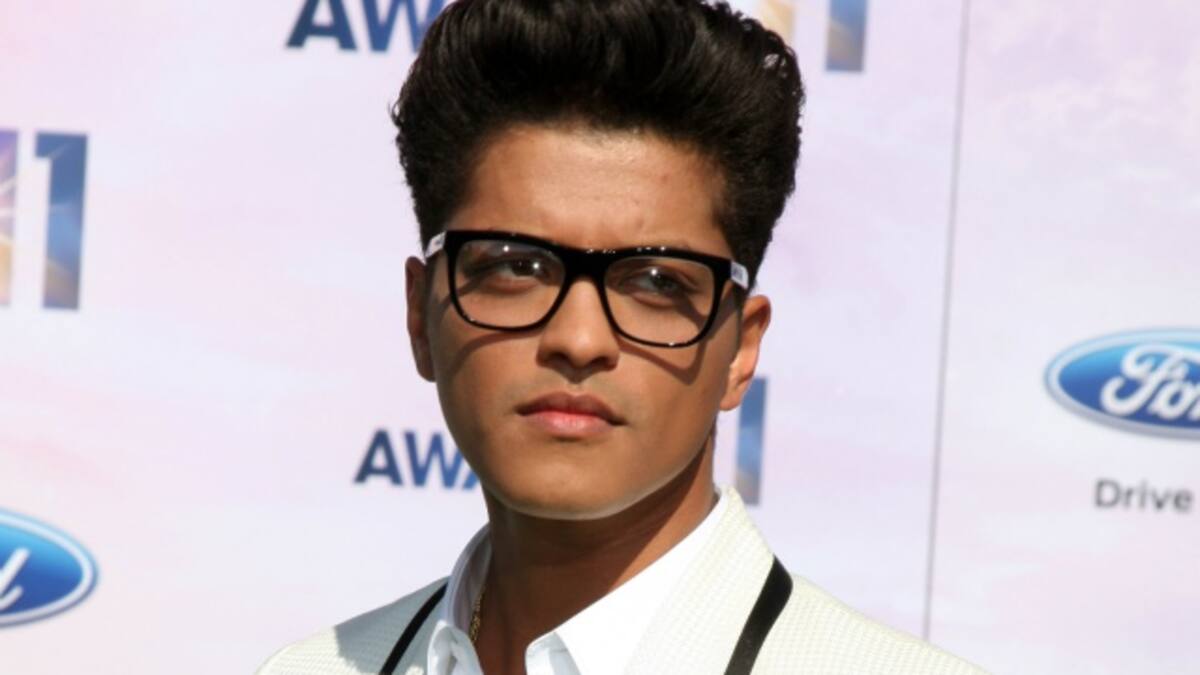 Paparazzis captan a Bruno Mars con unos cuantos kilitos de más