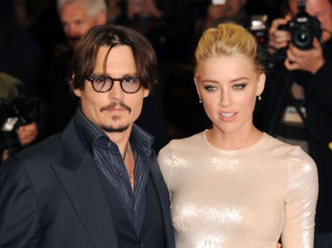 GETTY/ Johnny Depp y Amber Heard comenzaron su relación mientras hacían la promo de Los diarios del ron.