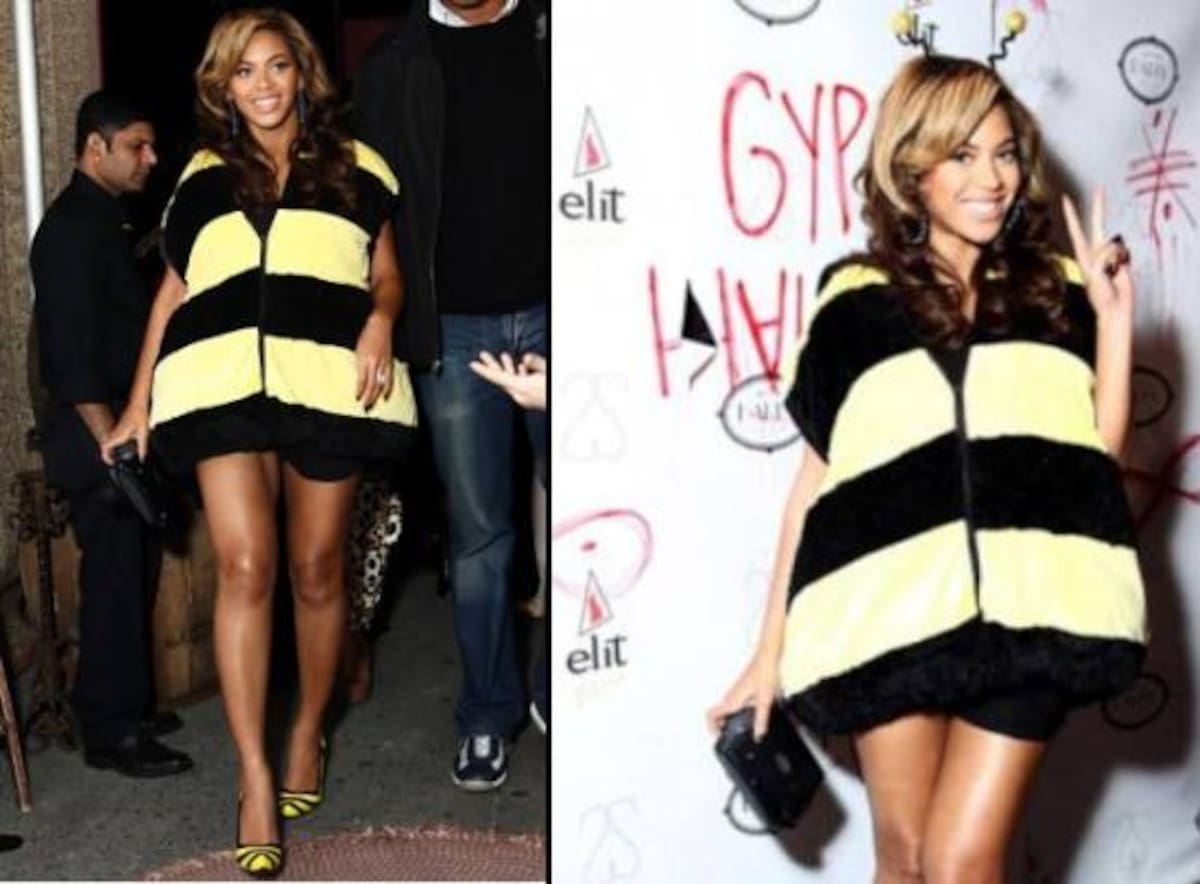 Beyoncé ha querido celebrar este año un Halloween muy especial. Embarazada y sabiendo ya que espera una niña, la cantante se ha disfrazo de abeja reina. Un vestuario con el que disimulaba su tripita y con el que parecía muy cómoda. Muy feliz y guapa, con el traje de rayas negro y amarillo, la guapísima cantante no ha querido dejar de lucir pierna, y por eso no ha querido perder la sensualidad de la que siempre hace gala y que el embarazo no ha restado un ápice.
