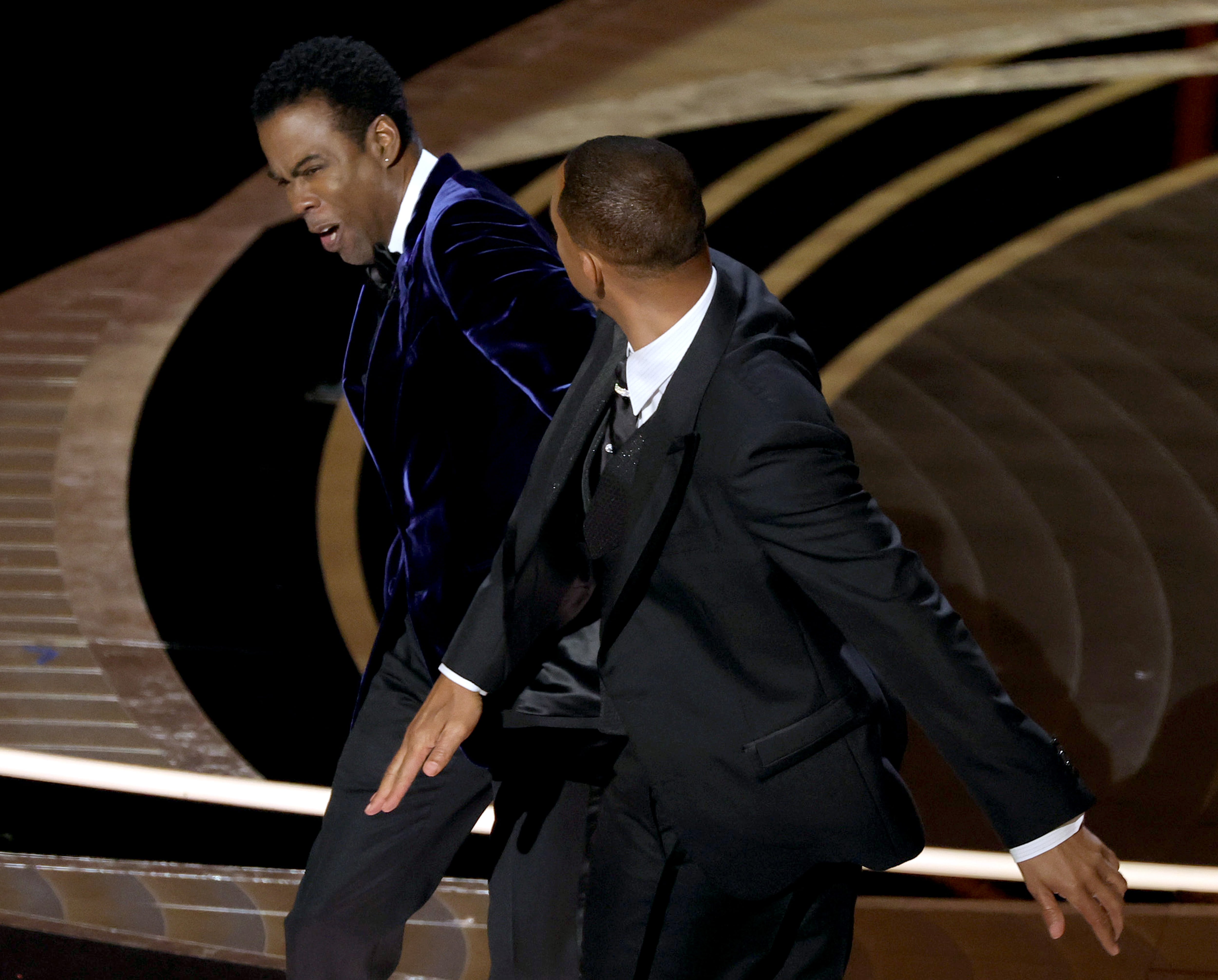 Will Smith abofeteando a Chris Rock en los Oscars de 2022. / Neilson Barnard/Getty