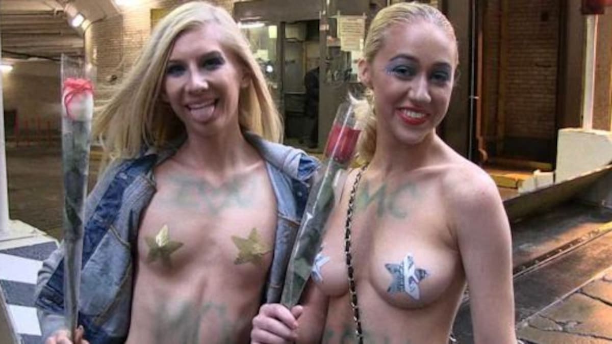 Fans de Miley Cyrus la esperan en "topless"