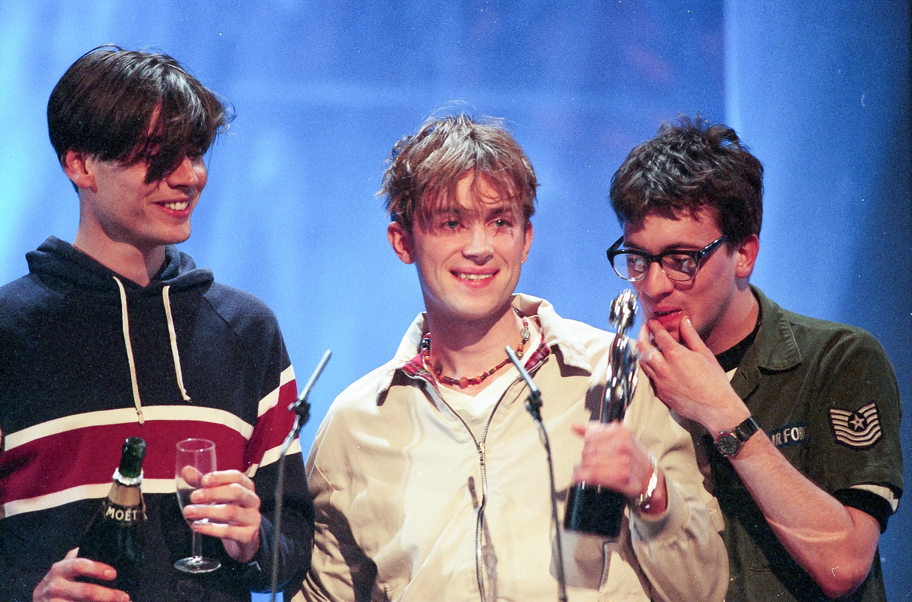 Alex James, Damon Albarn y Graham Coxon, Blur, en los Brit Awards 1995.