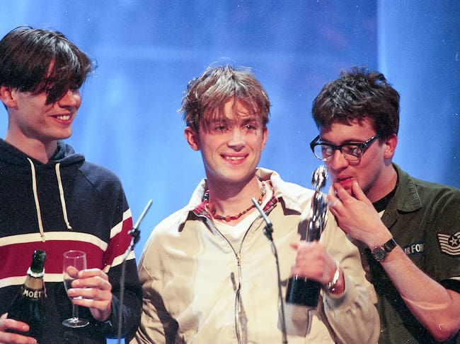 Alex James, Damon Albarn y Graham Coxon, Blur, en los Brit Awards 1995.