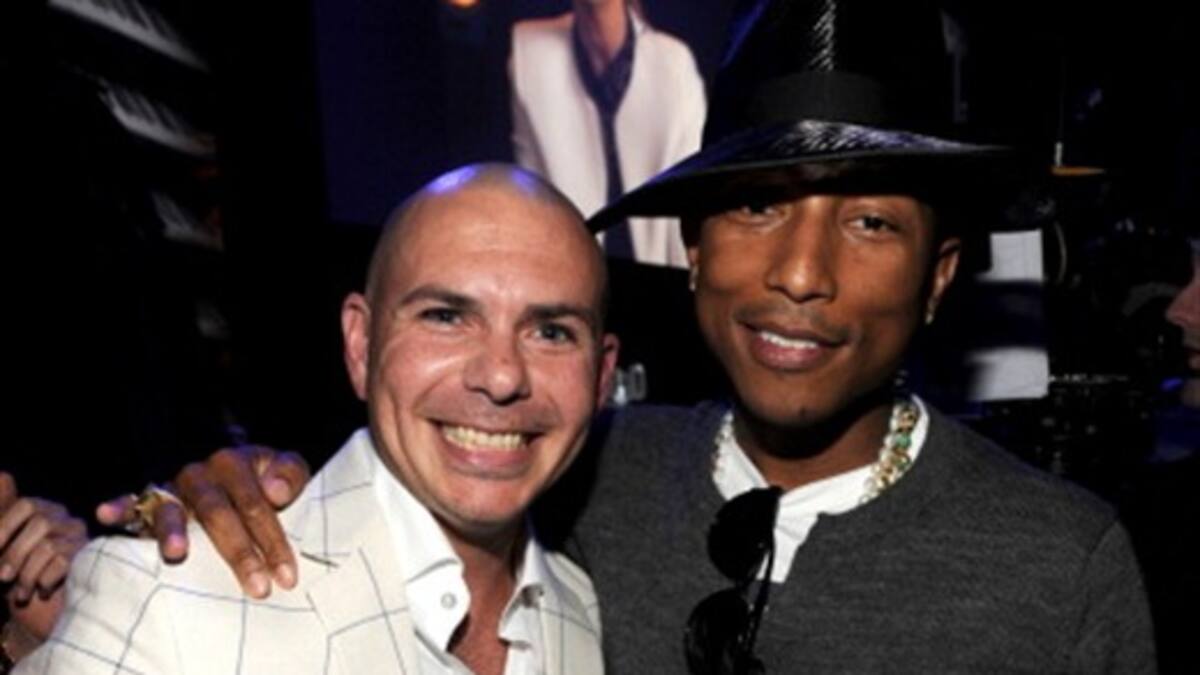 Pitbull y Pharrell en el Paseo de la Fama