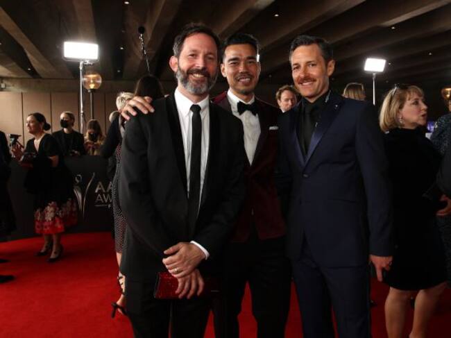 Dave Lawson (izquierda) junto Adrian Charella y Micahel Lucas.