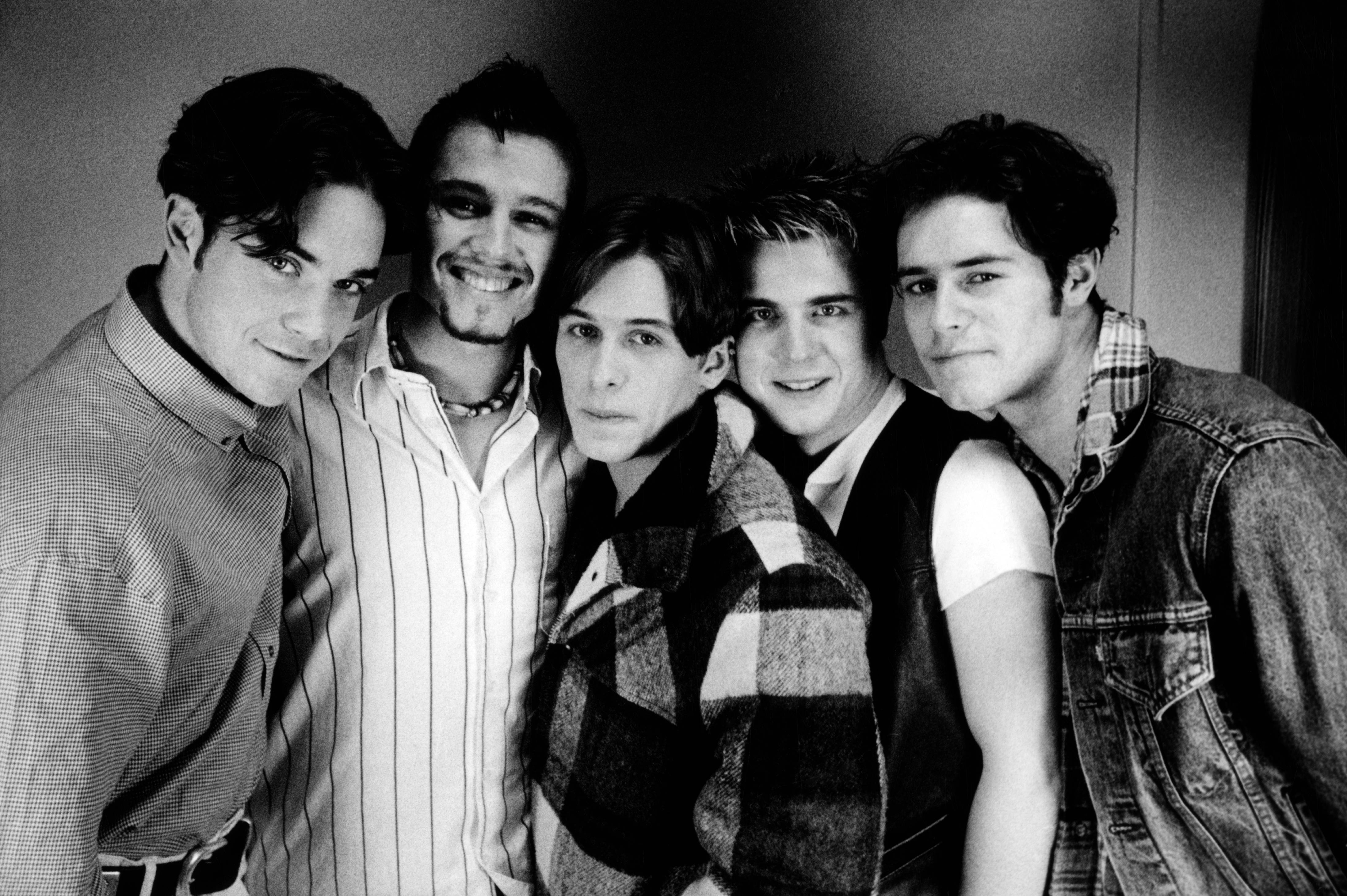 Robbie Williams, Jason Orange, Mark Owen, Gary Barlow y Howard Donald