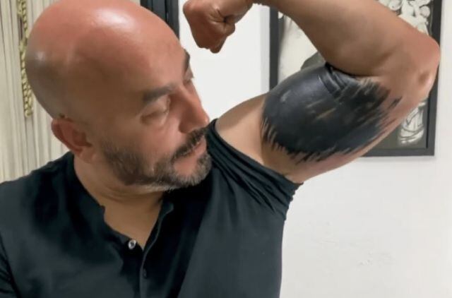 Tras tatuaje a Lupillo, tatuador ofrece sus servicios a Christian Nodal para quitarse los de Belinda