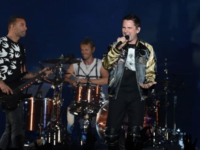 Chris Wolstenholme, Dominic Howard y Matt Bellamy de Muse durante un concierto en Inglewood (California) en 2017.