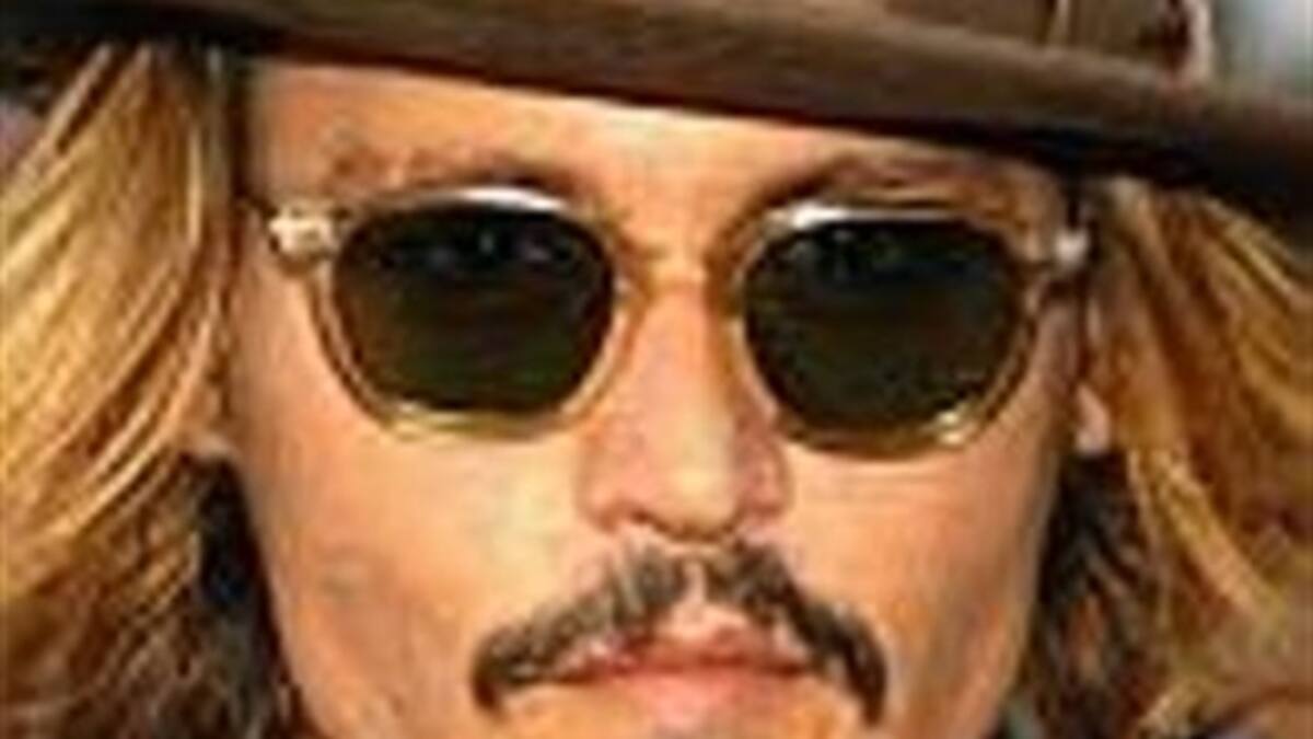 Johnny Depp sorprende con actuación musical en directo