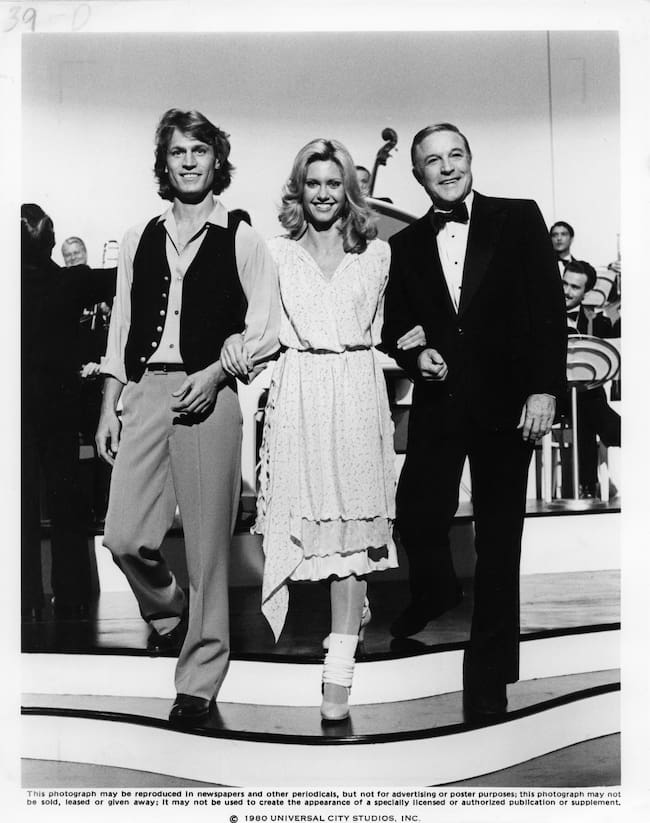 Michael Beck, Olivia Newton-John y Gene Kelly en la película Xanadu.
