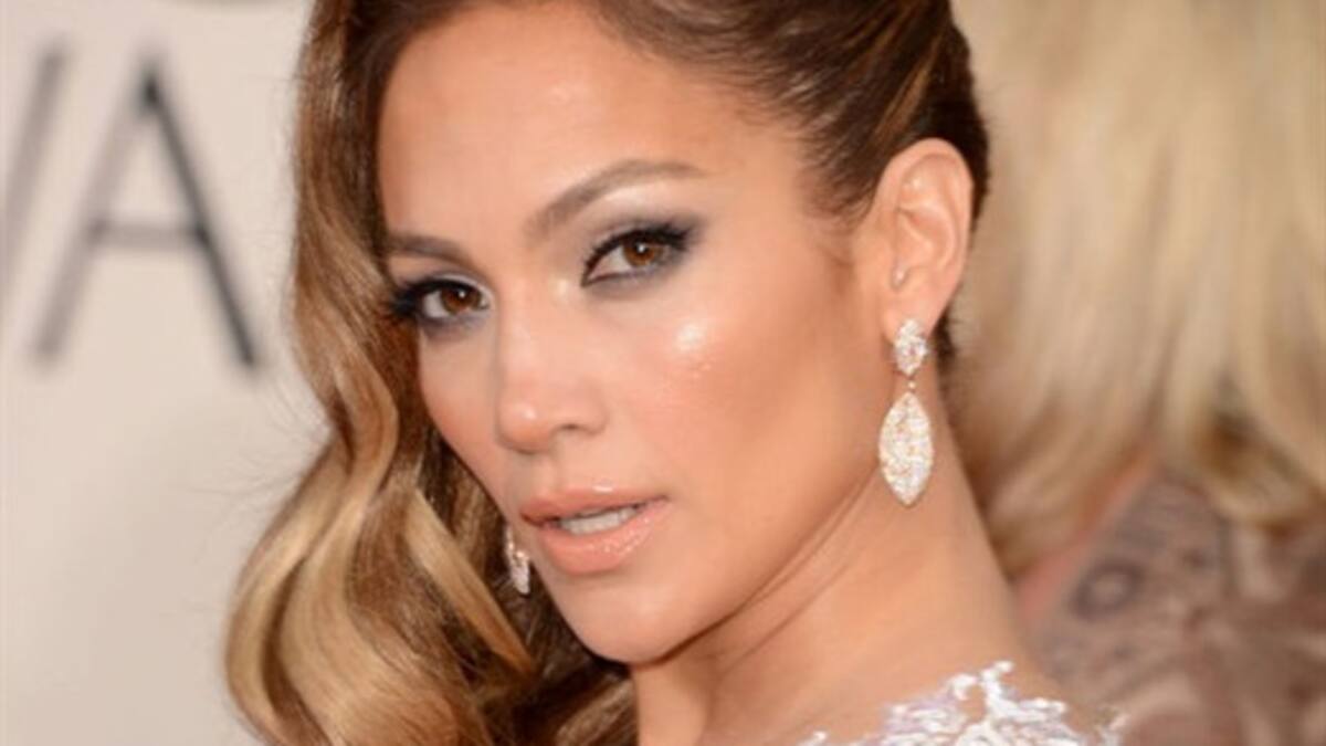 Globos de Oro 2013: Jennifer López luce vestido transparente y novio