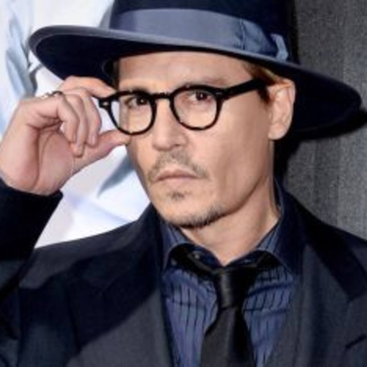 Johnny Depp modificó un tatuaje de su flamante ex