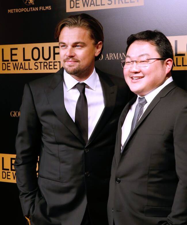 Leonardo DiCaprio junto a Jho Low, en el estreno de &#039;El lobo de Wall Street&#039; en París, en diciembre de 2013.